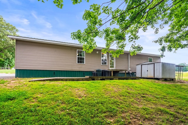2751 Jarrell Ridge Rd, Clarksville, TN 37043 - rear view of house featuring a lawn and a wooden deck