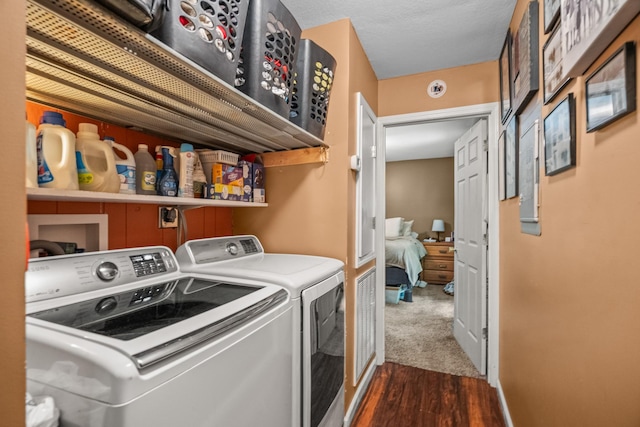 2751 Jarrell Ridge Rd, Clarksville, TN 37043 - washroom featuring washer and dryer and dark wood-type flooring