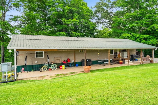2751 Jarrell Ridge Rd, Clarksville, TN 37043 - exterior space with a lawn, a patio, and metal roof