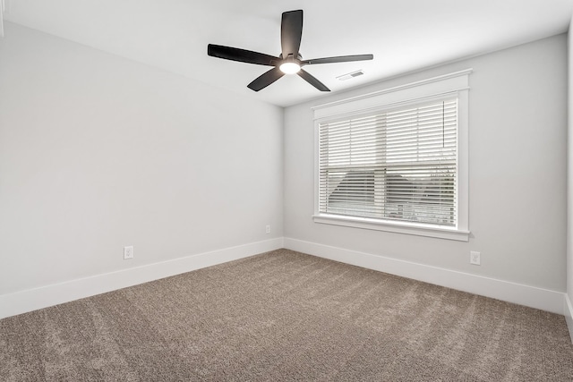 528 Kingwood Ln, White House, TN 37188 - empty room featuring carpet flooring, a ceiling fan, and baseboards