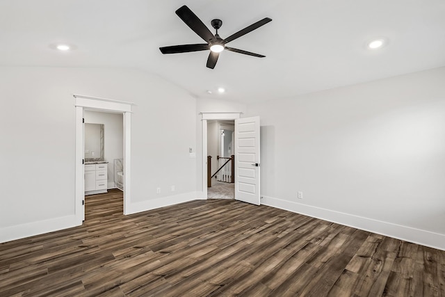 528 Kingwood Ln, White House, TN 37188 - unfurnished bedroom with dark wood-style flooring, lofted ceiling, baseboards, recessed lighting, and connected bathroom