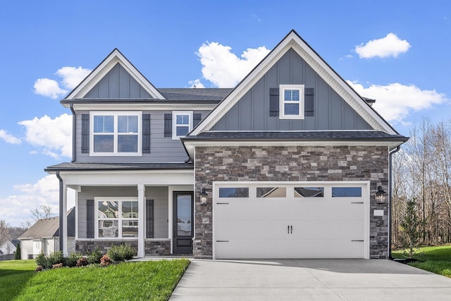 528 Kingwood Ln, White House, TN 37188 - craftsman-style house with stone siding, board and batten siding, driveway, and a garage