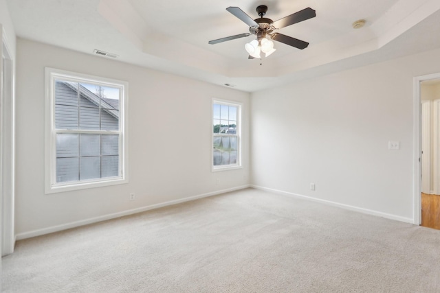 2889 Sharpie Dr, Clarksville, TN 37040 - empty room with a raised ceiling, carpet, baseboards, and ceiling fan