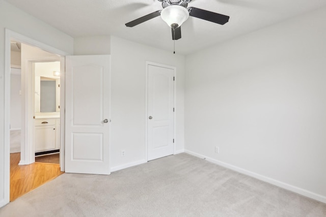 2889 Sharpie Dr, Clarksville, TN 37040 - unfurnished bedroom featuring light colored carpet, baseboards, and a ceiling fan