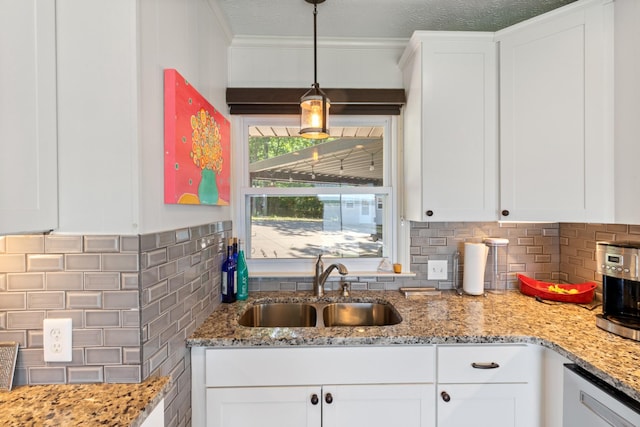 440 Bluff Point Ln, Waverly, TN 37185 - kitchen featuring a sink, tasteful backsplash, dishwasher, crown molding, and white cabinetry