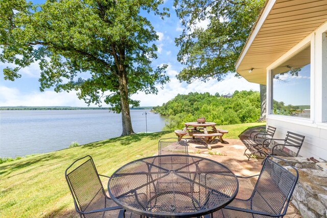 440 Bluff Point Ln, Waverly, TN 37185 - view of patio / terrace with outdoor dining space and a water view