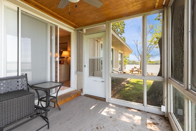 440 Bluff Point Ln, Waverly, TN 37185 - sunroom / solarium featuring ceiling fan and a water view