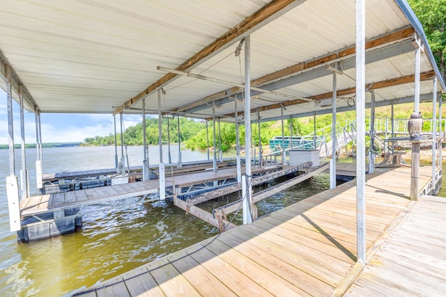 440 Bluff Point Ln, Waverly, TN 37185 - dock featuring boat lift and a water view