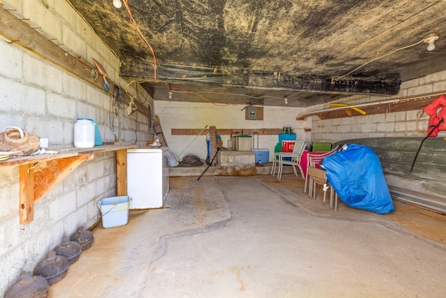 440 Bluff Point Ln, Waverly, TN 37185 - below grade area featuring refrigerator and concrete block wall