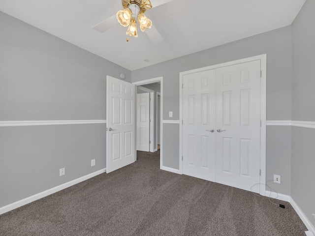 3825 Roscommon Way, Clarksville, TN 37040 - unfurnished bedroom featuring dark carpet, baseboards, a closet, and ceiling fan