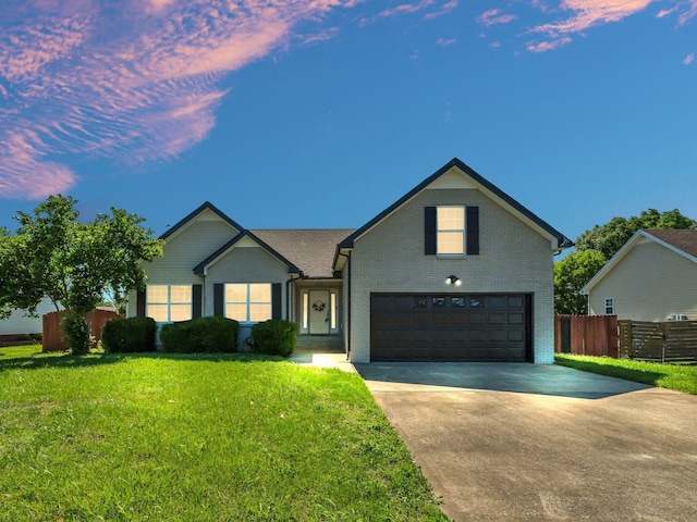 3825 Roscommon Way, Clarksville, TN 37040 - traditional-style home featuring concrete driveway, brick siding, and an attached garage