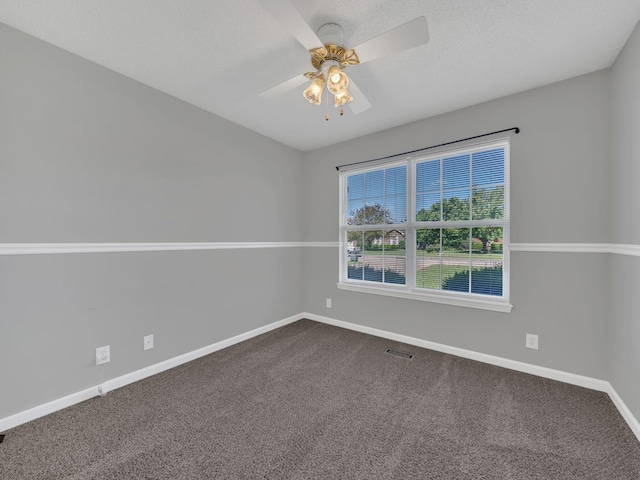 3825 Roscommon Way, Clarksville, TN 37040 - empty room featuring baseboards, dark colored carpet, and ceiling fan