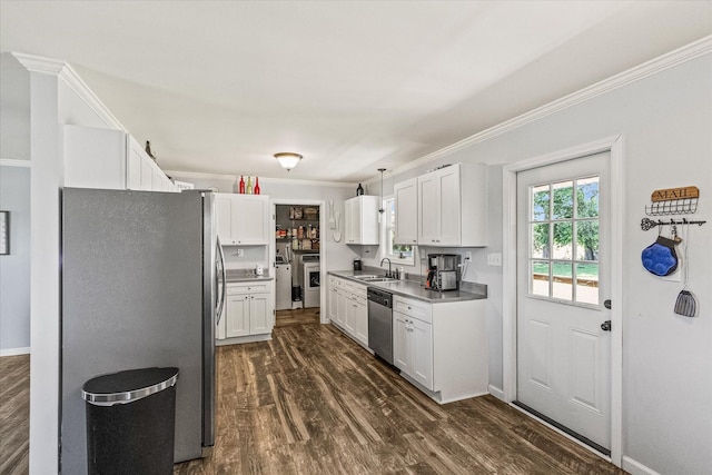84 Del Toro Dr, Sparta, TN 38583 - kitchen featuring stainless steel appliances, a sink, white cabinetry, crown molding, and dark wood-style floors