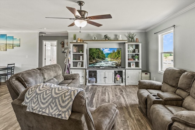 84 Del Toro Dr, Sparta, TN 38583 - living room with wood finished floors, ceiling fan, and crown molding