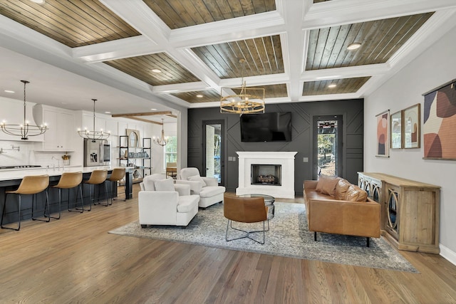 4480 Old Murfreesboro Rd W, Lebanon, TN 37090 - living area featuring a chandelier, coffered ceiling, light wood-type flooring, beam ceiling, and recessed lighting