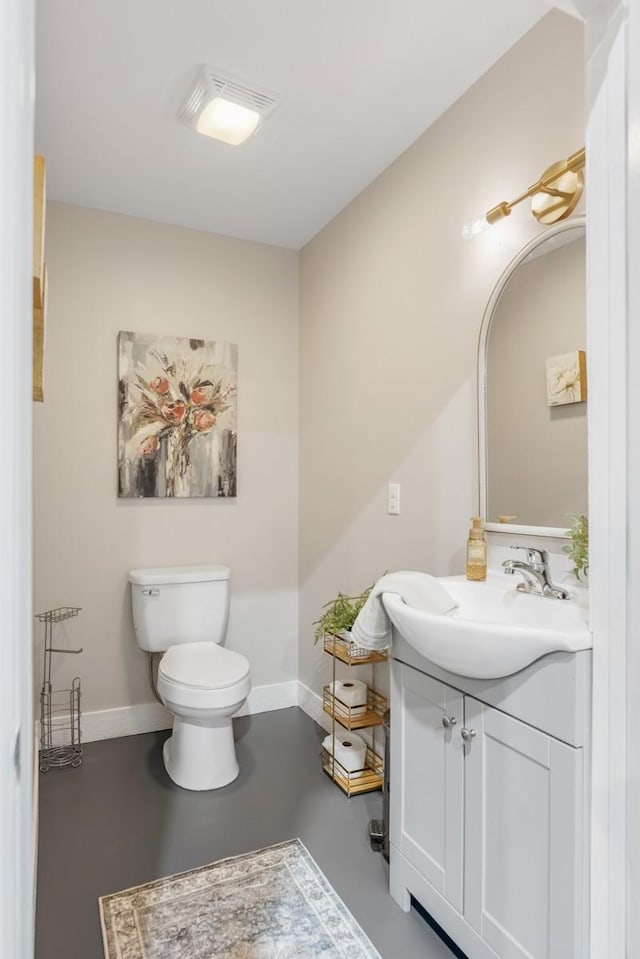 2878 Fly Rd, Santa Fe, TN 38482 - bathroom with finished concrete flooring, vanity, baseboards, and toilet