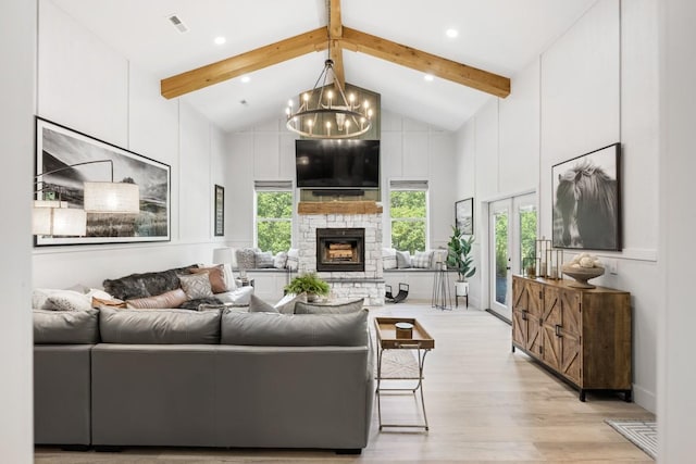 2878 Fly Rd, Santa Fe, TN 38482 - living area with light wood-style flooring, a chandelier, a stone fireplace, and recessed lighting