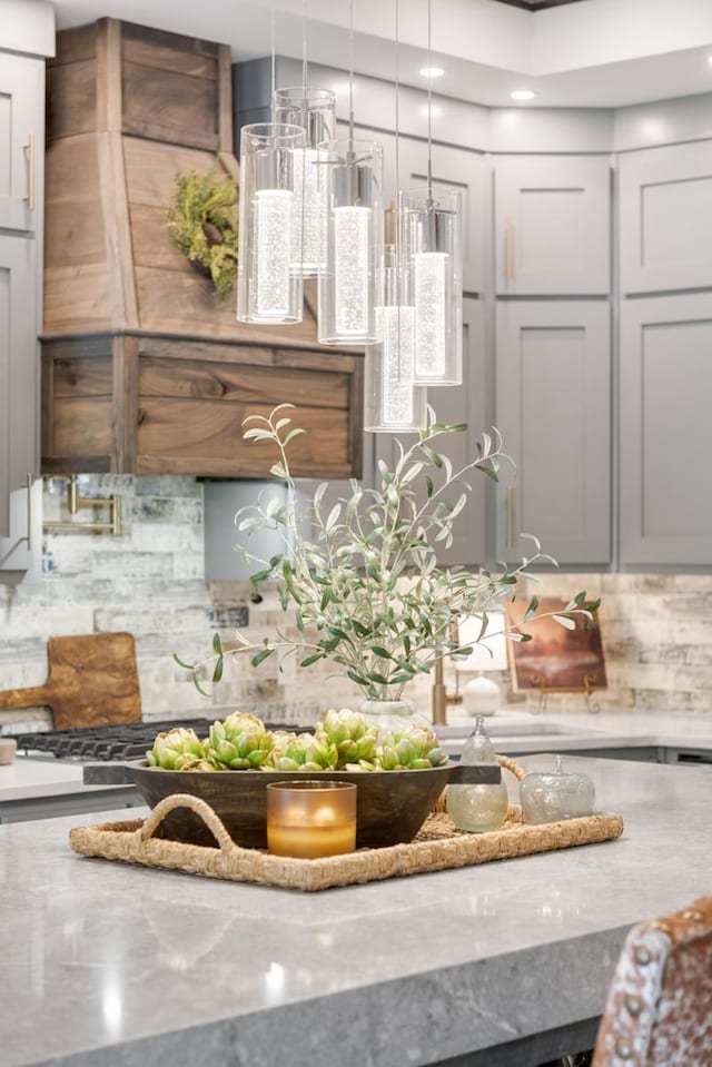 2878 Fly Rd, Santa Fe, TN 38482 - kitchen view of decorative backsplash, light stone countertops, and recessed lighting