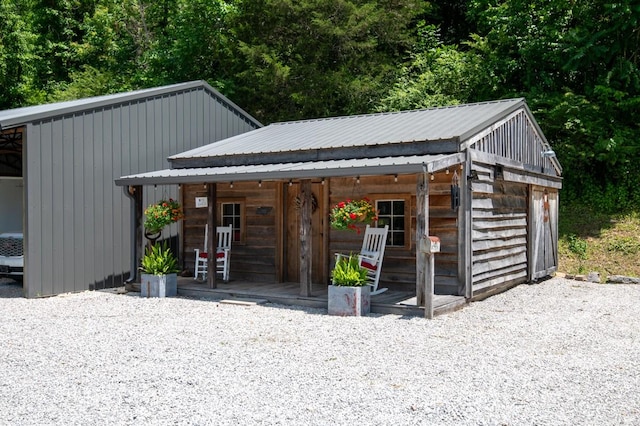 2878 Fly Rd, Santa Fe, TN 38482 - view of outbuilding with covered porch