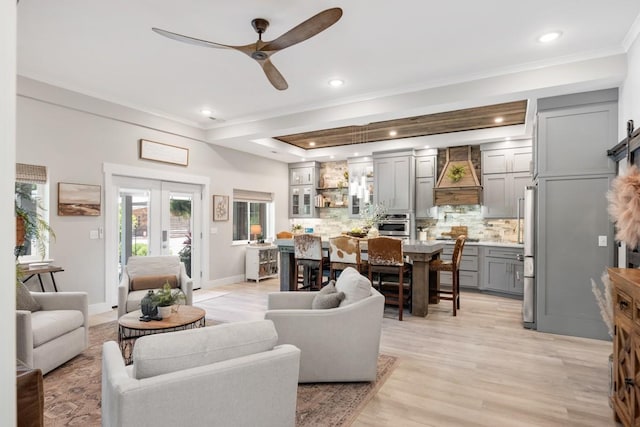 2878 Fly Rd, Santa Fe, TN 38482 - living room featuring a ceiling fan, ornamental molding, light wood finished floors, recessed lighting, and french doors