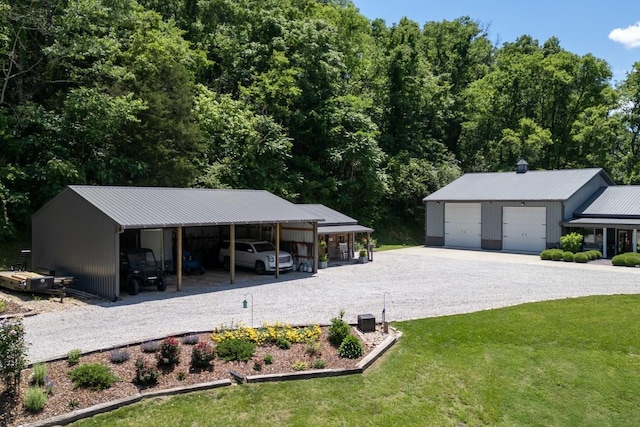 2878 Fly Rd, Santa Fe, TN 38482 - exterior space featuring a yard, metal roof, and gravel driveway