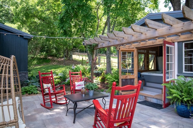 2878 Fly Rd, Santa Fe, TN 38482 - view of patio with a hot tub and a pergola