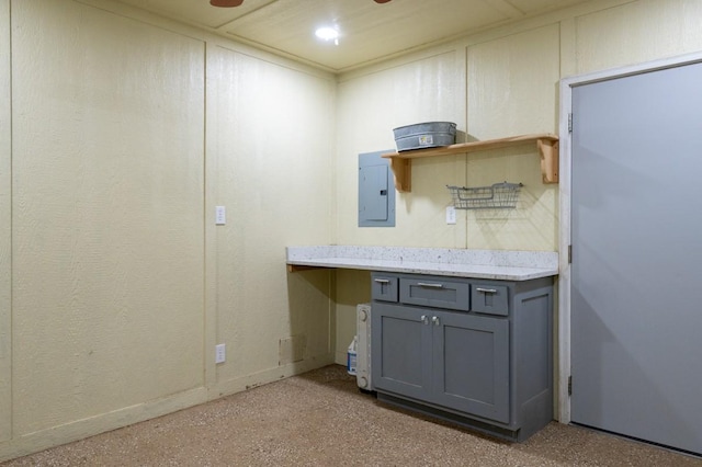 2878 Fly Rd, Santa Fe, TN 38482 - kitchen featuring gray cabinetry, electric panel, open shelves, light countertops, and baseboards