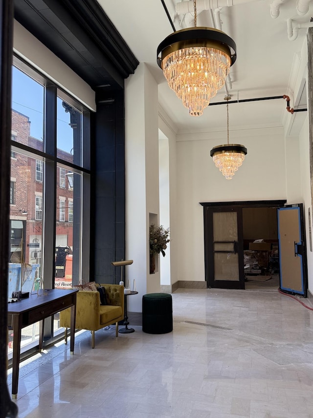 117 E 7th St Unit 902, Chattanooga, TN 37402 - building lobby featuring a towering ceiling and crown molding