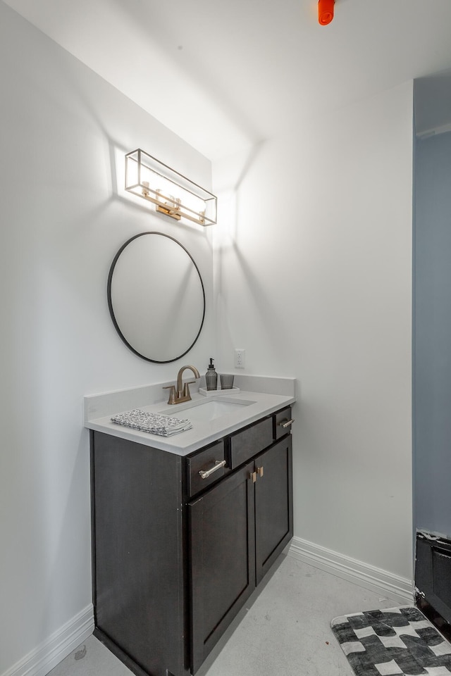 117 E 7th St Unit 302, Chattanooga, TN 37402 - bathroom with vanity and baseboards