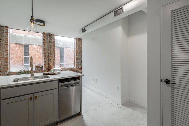 117 E 7th St Unit 302, Chattanooga, TN 37402 - kitchen featuring dishwasher, gray cabinets, a sink, baseboards, and healthy amount of natural light
