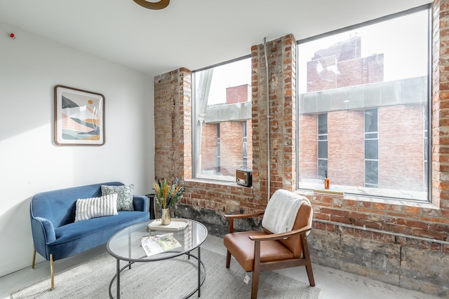 117 E 7th St Unit 302, Chattanooga, TN 37402 - sitting room with brick wall