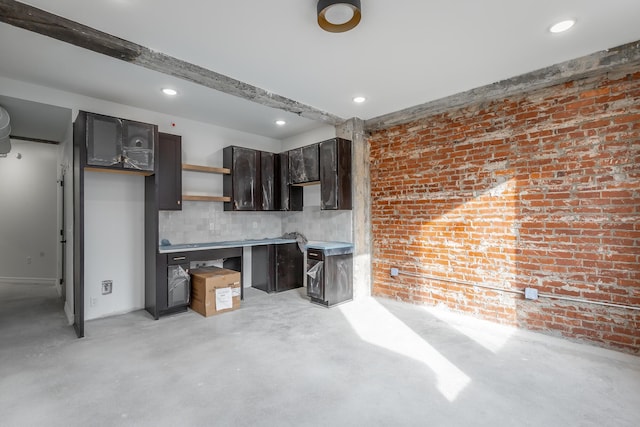 117 E 7th St Unit 206, Chattanooga, TN 37402 - kitchen featuring dark brown cabinets, concrete flooring, open shelves, recessed lighting, and decorative backsplash