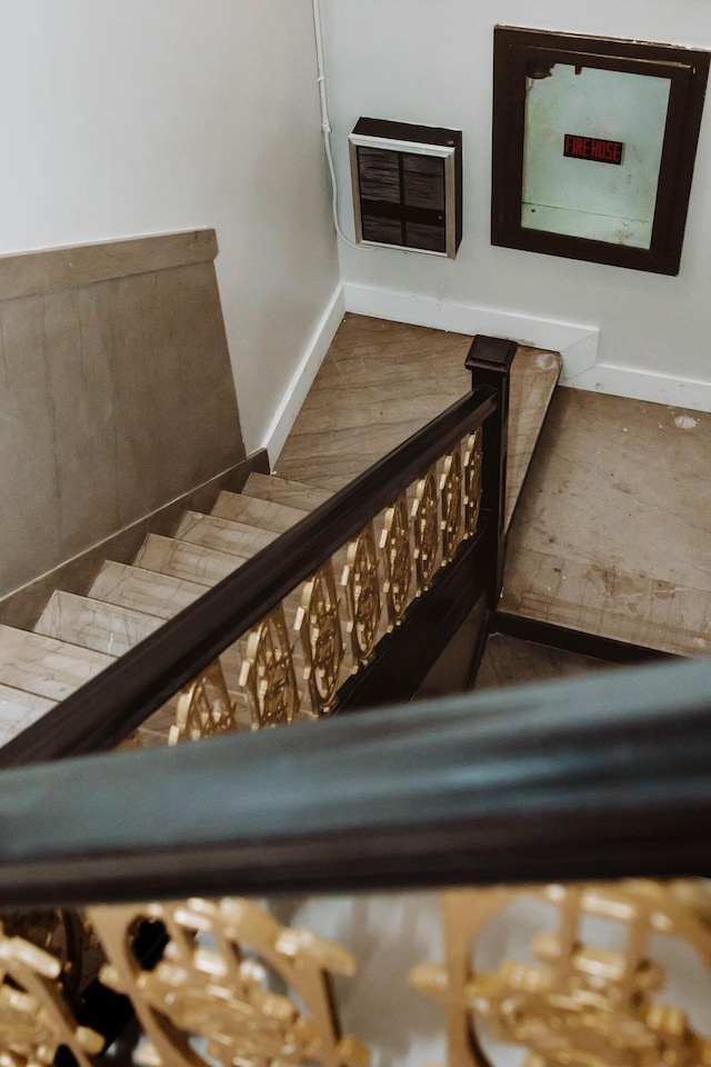 117 E 7th St Unit 206, Chattanooga, TN 37402 - stairs featuring heating unit and baseboards