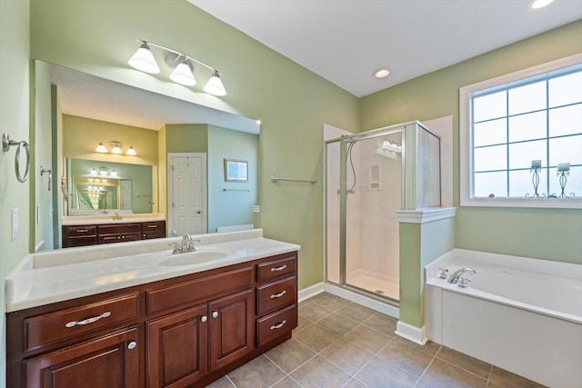 502 Tarver Ct, Smyrna, TN 37167 - full bath featuring a stall shower, vanity, a bath, tile patterned flooring, and recessed lighting