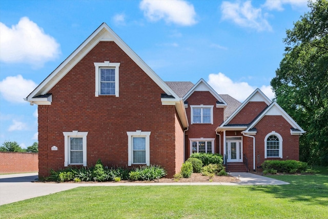 502 Tarver Ct, Smyrna, TN 37167 - traditional-style house with brick siding and a front lawn