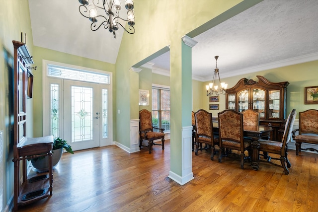 502 Tarver Ct, Smyrna, TN 37167 - entryway with a chandelier, wood finished floors, a towering ceiling, and crown molding