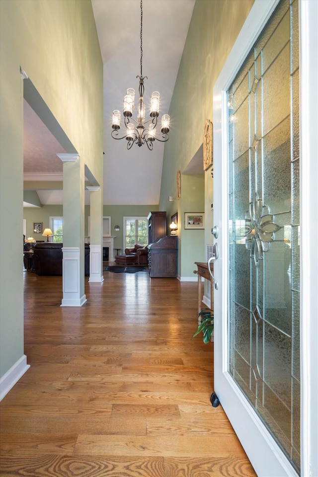 502 Tarver Ct, Smyrna, TN 37167 - entryway featuring high vaulted ceiling, light wood-type flooring, and a chandelier