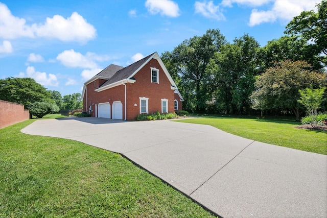 502 Tarver Ct, Smyrna, TN 37167 - view of side of property with concrete driveway, brick siding, and a lawn