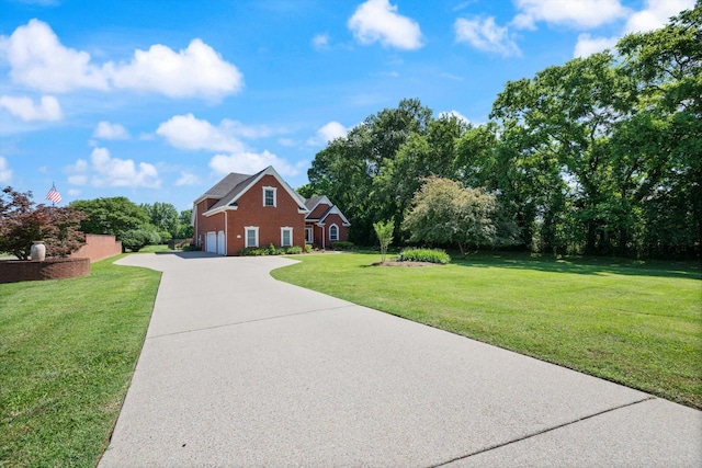 502 Tarver Ct, Smyrna, TN 37167 - view of front of property with concrete driveway, a front yard, a garage, and brick siding