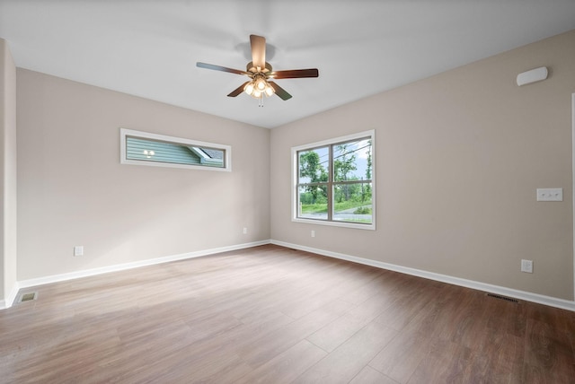 102 Colson Rd, Dover, TN 37058 - spare room featuring wood finished floors, a ceiling fan, and baseboards