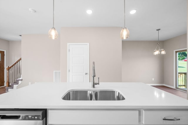 102 Colson Rd, Dover, TN 37058 - kitchen featuring a sink, stainless steel dishwasher, light countertops, pendant lighting, and recessed lighting
