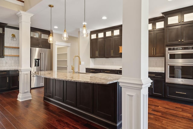 3317 Clovercroft Dr, Murfreesboro, TN 37130 - kitchen featuring decorative columns, stainless steel appliances, decorative backsplash, dark wood-style flooring, and recessed lighting