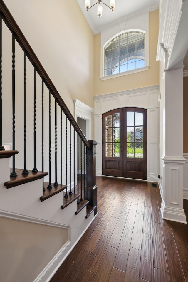 3317 Clovercroft Dr, Murfreesboro, TN 37130 - foyer entrance featuring a high ceiling, hardwood / wood-style flooring, crown molding, plenty of natural light, and a chandelier