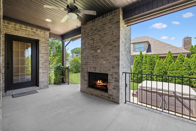 3317 Clovercroft Dr, Murfreesboro, TN 37130 - view of patio / terrace featuring an outdoor brick fireplace, a hot tub, and a ceiling fan