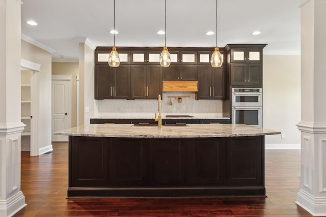 3317 Clovercroft Dr, Murfreesboro, TN 37130 - kitchen with double oven, a sink, dark wood finished floors, dark brown cabinets, and decorative backsplash