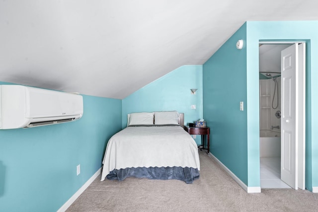 802 N 16th St, Nashville, TN 37206 - bedroom with a wall unit AC, carpet flooring, vaulted ceiling, and baseboards