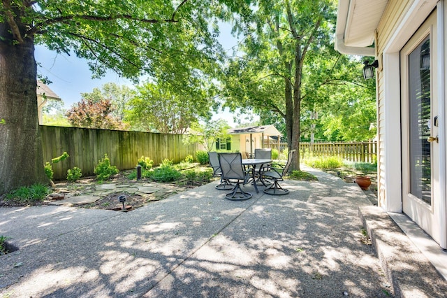 802 N 16th St, Nashville, TN 37206 - fenced backyard featuring a patio area and outdoor dining space
