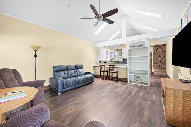 802 N 16th St, Nashville, TN 37206 - living area with a skylight, ceiling fan, an AC wall unit, vaulted ceiling, and dark wood-style flooring
