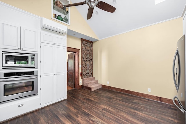 802 N 16th St, Nashville, TN 37206 - kitchen featuring appliances with stainless steel finishes, dark wood-style floors, white cabinetry, baseboards, and ceiling fan