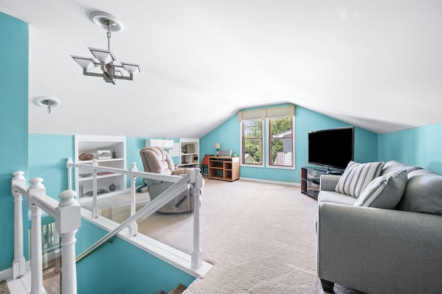 802 N 16th St, Nashville, TN 37206 - living room with carpet, vaulted ceiling, a chandelier, built in shelves, and baseboards